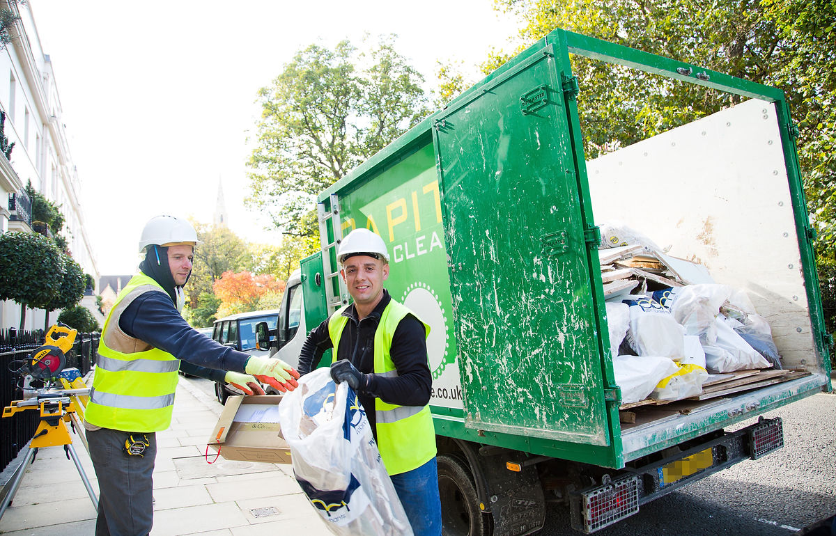 Capital Waste Clearance operative carrying waste